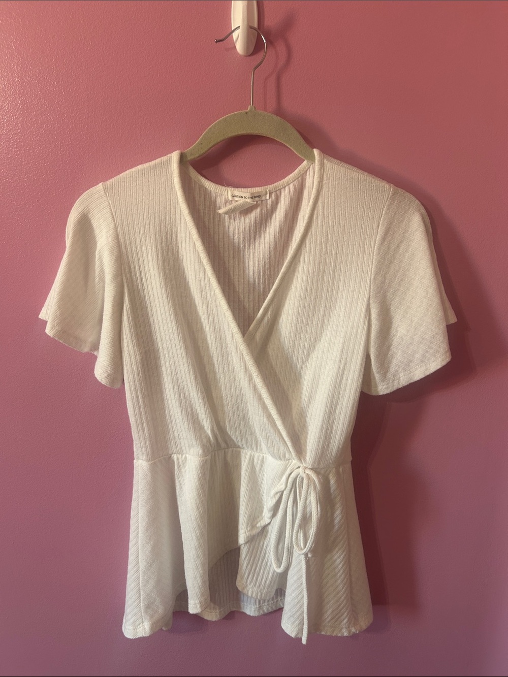 Caution To The Wind White Ribbed Wrap Peplum Top